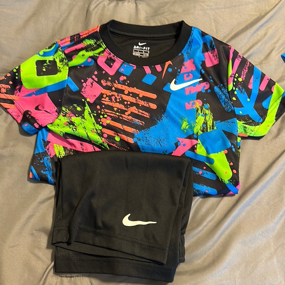 Nike boy size 7 short sleeve shirt and short set.